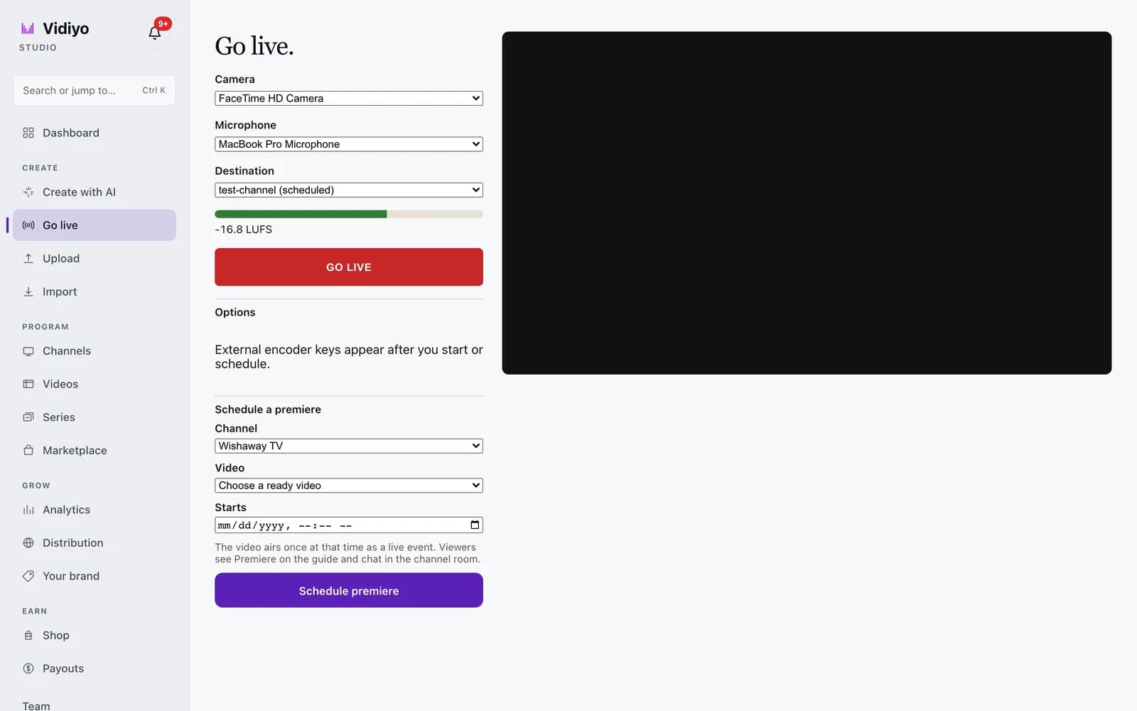 The Schedule a premiere section expanded on the Go live page: Channel set to Wishaway TV, Video set to Choose a ready video, an empty Starts date and time field, the note The video airs once at that time as a live event. Viewers see Premiere on the guide and chat in the channel room, and a purple Schedule premiere button