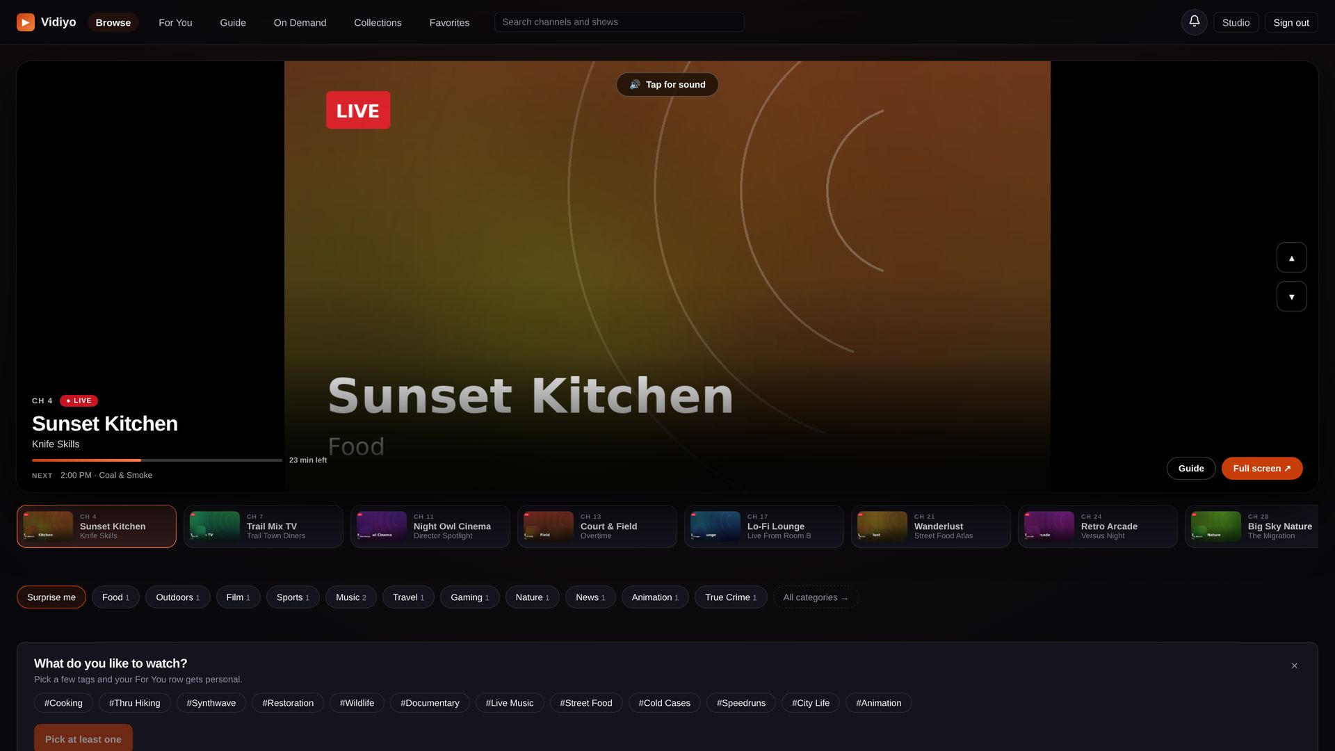 A branded live TV stage with channel dial, the kind of viewer surface a white-label network can own